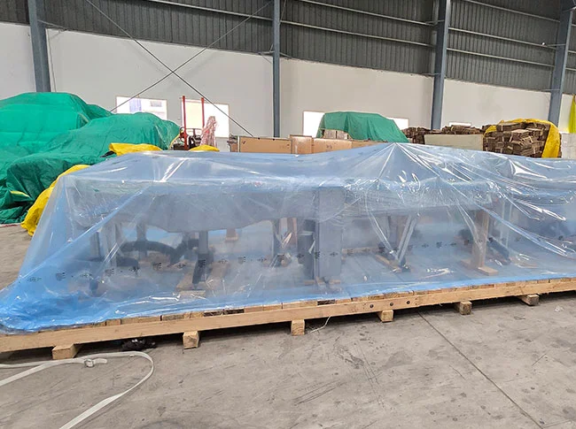 heavy-duty machinery is secured on a wooden pallet