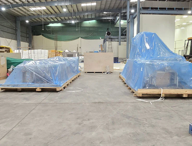 large industrial machines packaged for transport